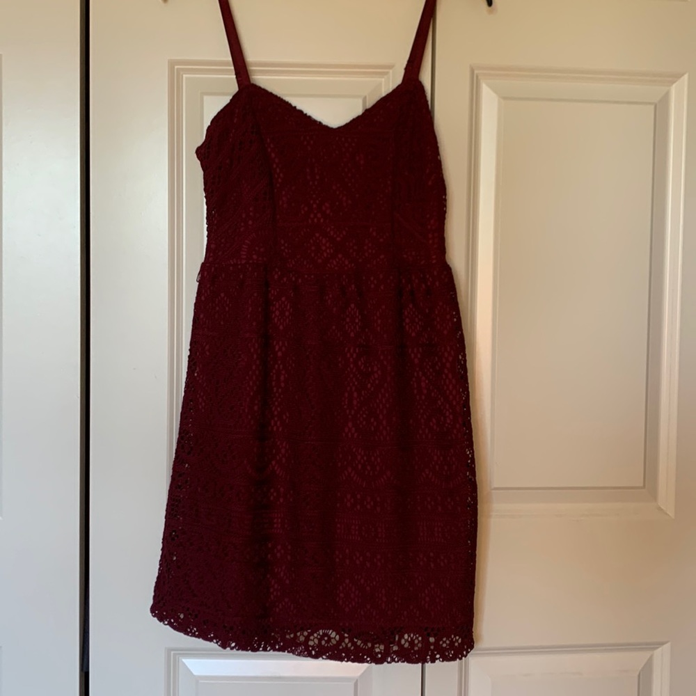 This is a maroon spaghetti strapped mini dress that’s cute and loose.